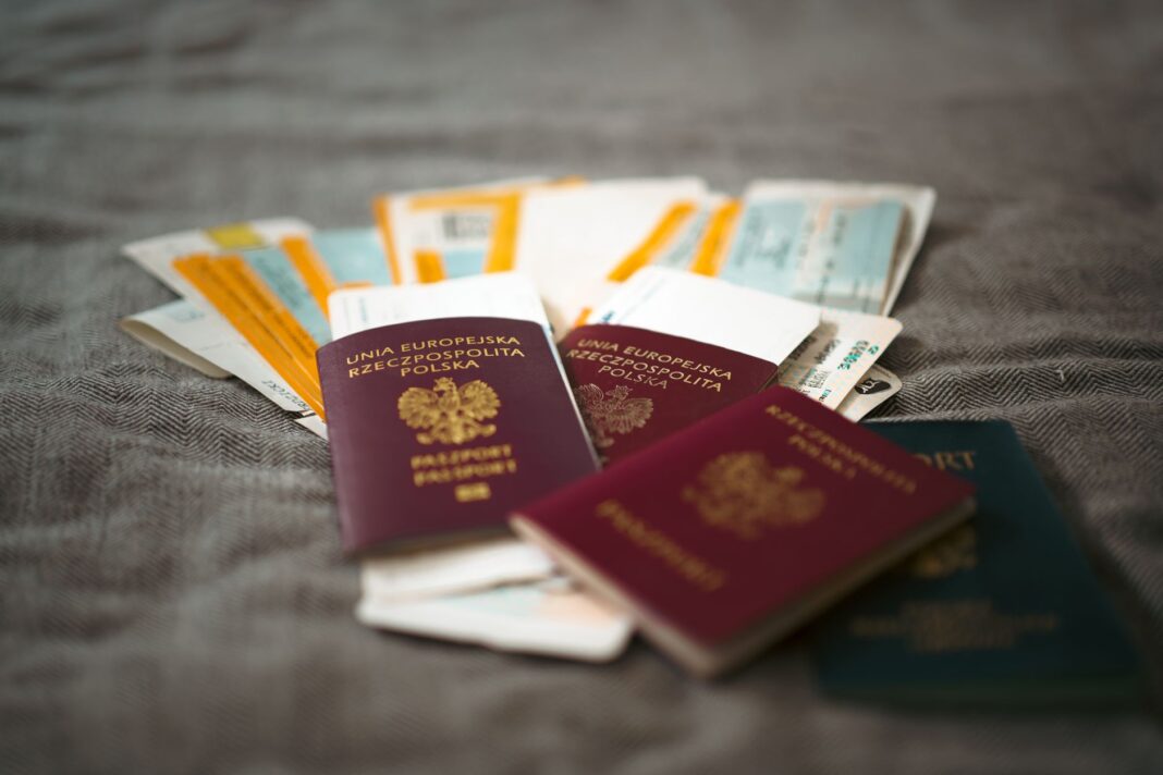 pexels-photo-33497885 polish passports and travel documents on a table